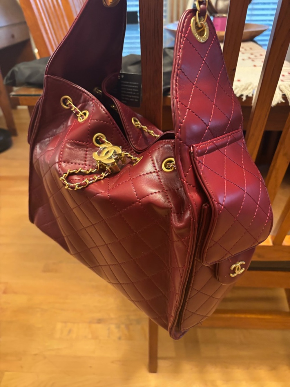 Small 25 quilted leather deep red shoulder bag with gold tone hardware NWOT